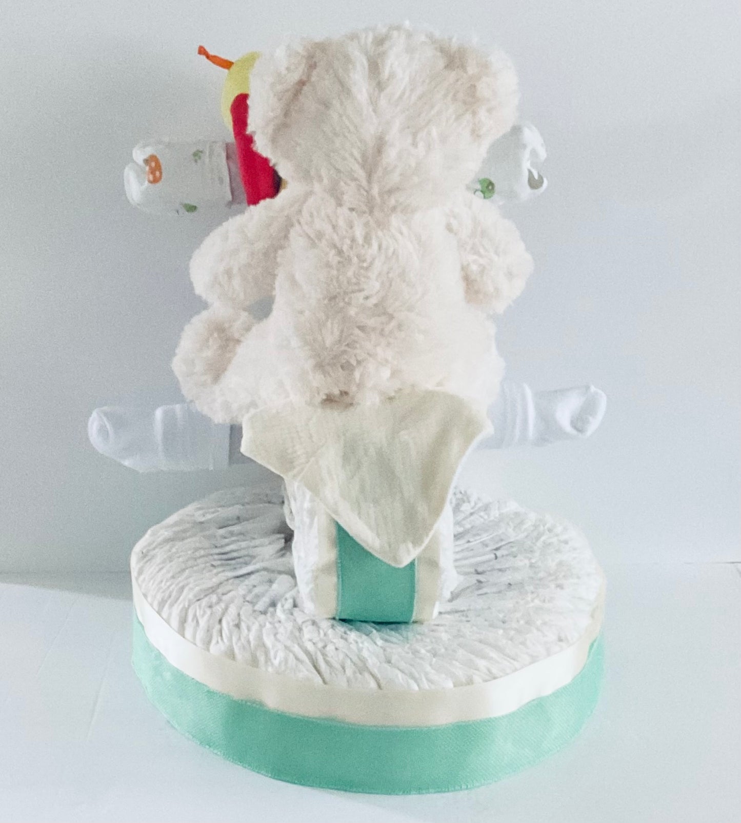1 TIER PAMPER CAKE WITH MOTORCYCLE AND TEDDY BEAR